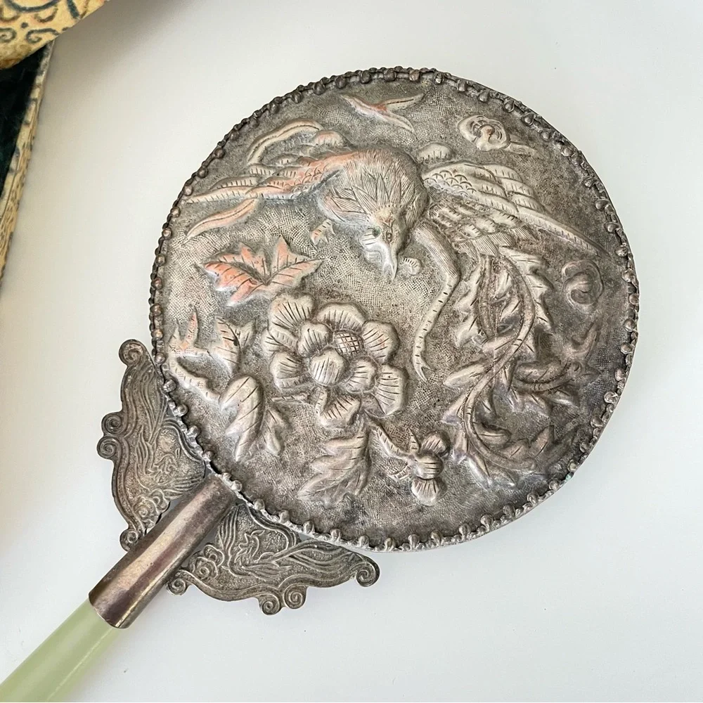 Vintage hand held vanity mirror jade handle silver tone birds floral metal